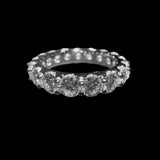 the "PINKY POINTER" Round Brilliant Cut Pointer Band